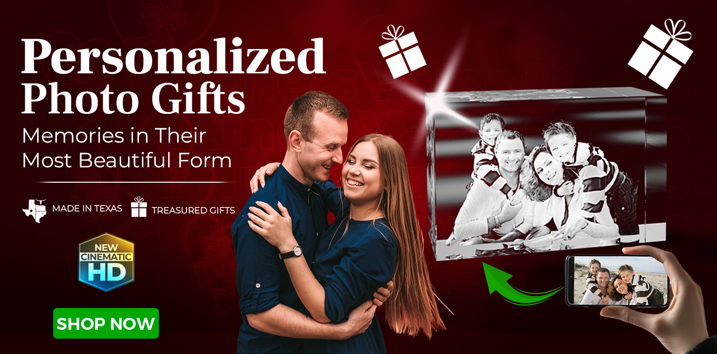 A couple embraces and smiles in the foreground. To the right, a hand holds a phone with their photo, which is depicted as a 3D crystal engraving. Text advertises personalized photo gifts and a green “Shop Now” button appears below.