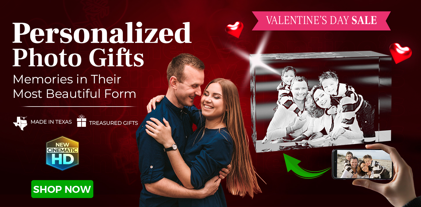 Banner advertising personalized photo gifts. A couple poses, smiling and hugging, next to a crystal photo engraving of a family. Valentine’s Day Sale and Shop Now are highlighted. Icons and text emphasize customization features.